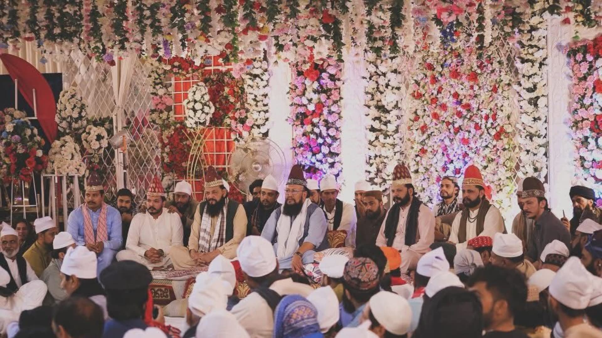 A powerful shot of Qawwali singers performing, their voices echoing peace.