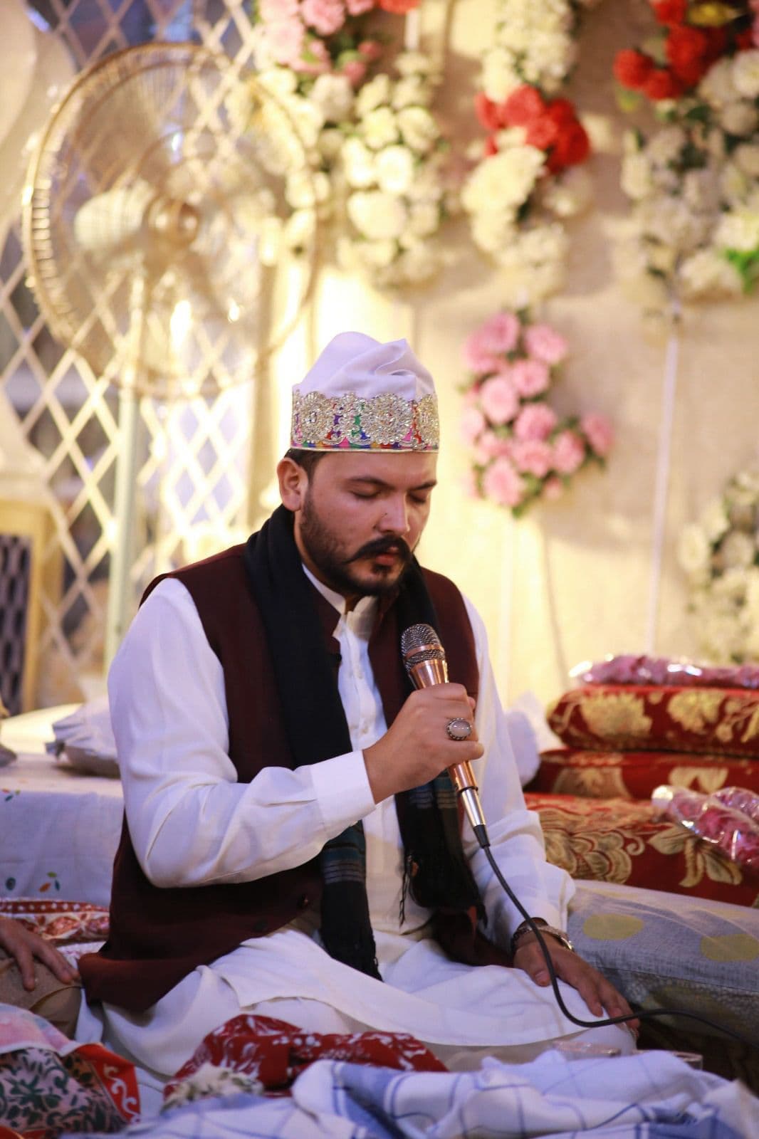 A second elegant portrait of a man, showing a different pose or setting.